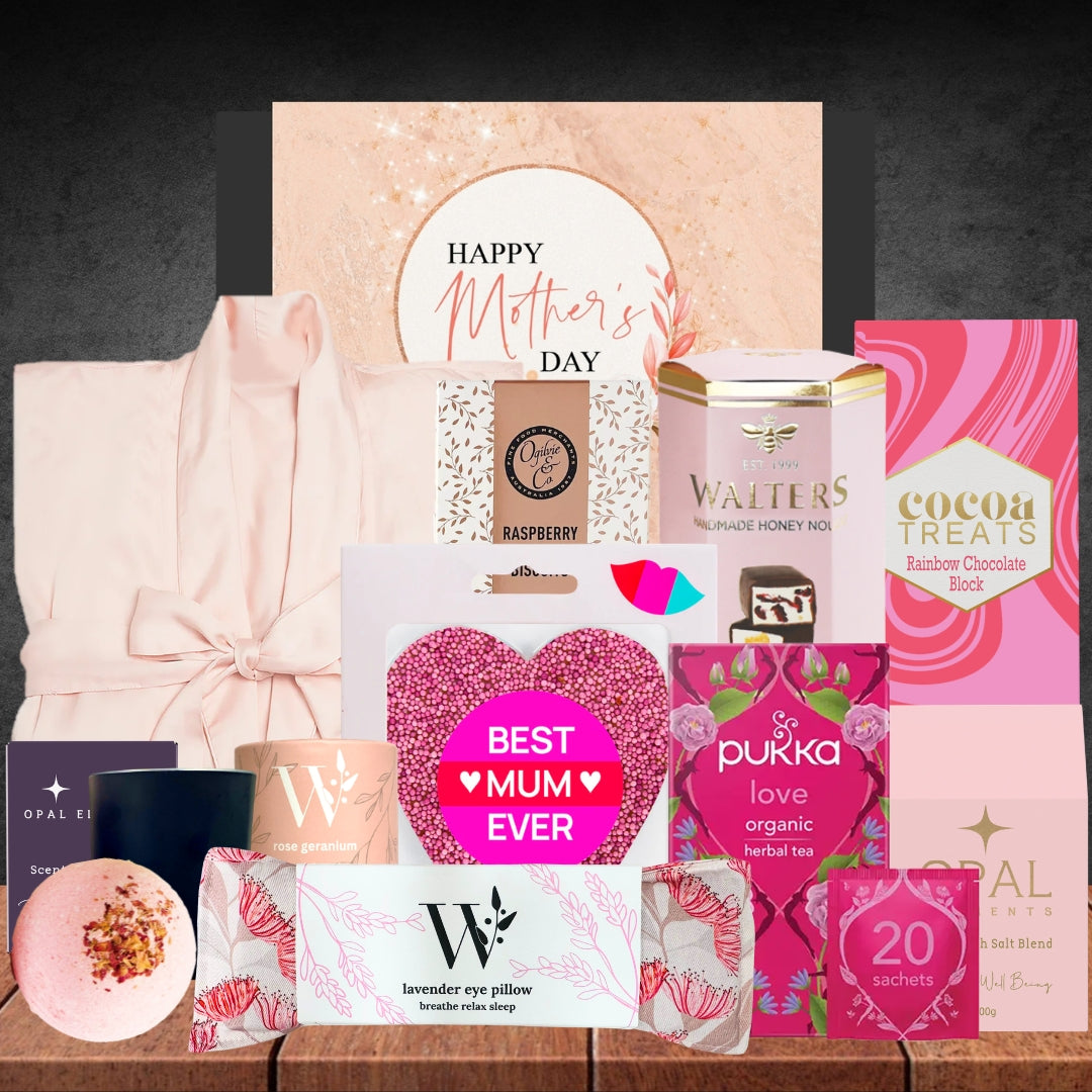 Collection of Mother's Day gifts including a robe, tea, and other items on a dark background